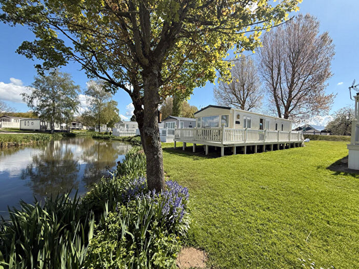 2 Bedroom Detached Bungalow For Sale In Mallard Lake, Cirencester, GL7