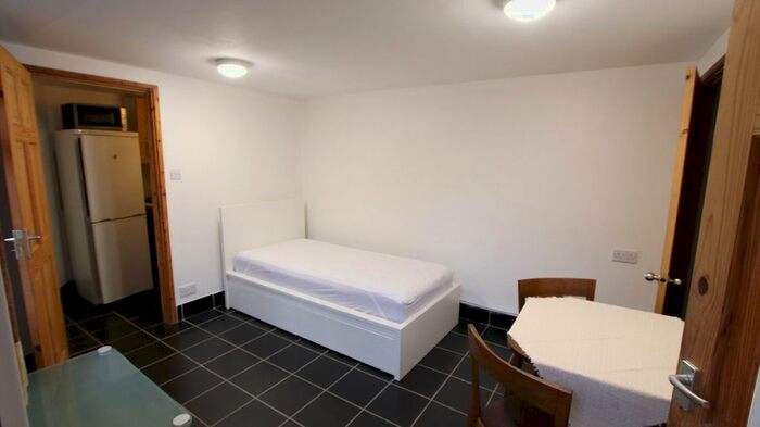 Studio To Rent In Bramber Road, London N12